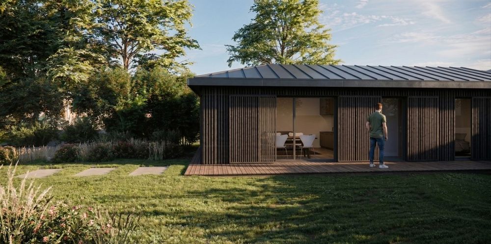 Annexe en bois dans un jardin à Lancieux